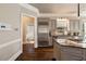 Spacious kitchen with stainless steel appliances and a large island with granite countertops at 3720 River Mansion Dr, Peachtree Corners, GA 30096