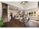 Open kitchen and dining area with hardwood floors and lots of natural light at 3720 River Mansion Dr, Peachtree Corners, GA 30096