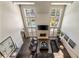 Spacious living room with high ceilings, a fireplace, and a view of the pool at 3720 River Mansion Dr, Peachtree Corners, GA 30096