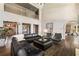 Inviting living room with fireplace, loft, and seamless transition to other rooms, perfect for entertaining at 3720 River Mansion Dr, Peachtree Corners, GA 30096