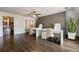 Office space with hardwood floors, trendy wall design and two sets of desks and chairs at 3720 River Mansion Dr, Peachtree Corners, GA 30096