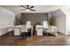 Office space with hardwood floors, trendy wall design and two sets of desks and chairs at 3720 River Mansion Dr, Peachtree Corners, GA 30096