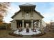 Stunning exterior with covered patio, ample seating, and a welcoming ambiance at 54 Black Gum Ln # 48, Auburn, GA 30011