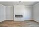 Spacious living room with a modern fireplace and plenty of room for entertaining guests at 608 Marimba Pike, Mcdonough, GA 30253