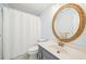 Bathroom featuring a white vanity and shower at 1260 Centenary Rdg, Snellville, GA 30078