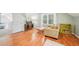 Sunny bedroom with a view, hardwood floors, a comfy couch and loft door at 1260 Centenary Rdg, Snellville, GA 30078