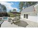Relax on the deck, which offers pool views and convenient access to the house at 1260 Centenary Rdg, Snellville, GA 30078