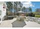 Spacious deck features a dining table and grill, perfect for outdoor entertaining at 1260 Centenary Rdg, Snellville, GA 30078