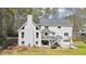 Charming exterior with a deck, patio, and a garage that offers convenience and outdoor enjoyment at 1260 Centenary Rdg, Snellville, GA 30078