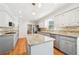 Bright and modern kitchen with stainless steel appliances, granite countertops and a large island at 1260 Centenary Rdg, Snellville, GA 30078
