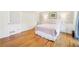Well-lit main bedroom includes a spacious closet and hardwood floors at 1260 Centenary Rdg, Snellville, GA 30078