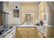 Updated kitchen featuring granite countertops, stainless appliances, and an abundance of storage space at 2260 Peachtree Nw Rd # D6, Atlanta, GA 30309