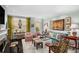 Well-lit living room with light blue walls, a fireplace, and French doors to the outside at 2260 Peachtree Nw Rd # D6, Atlanta, GA 30309