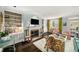 Living room featuring a fireplace, wet bar, and hardwood floors at 2260 Peachtree Nw Rd # D6, Atlanta, GA 30309
