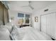 Bright main bedroom with a four-poster bed, white walls and bright natural light at 2260 Peachtree Nw Rd # D6, Atlanta, GA 30309