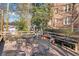 Spacious outdoor deck with comfortable seating, perfect for entertaining and enjoying the scenery at 2260 Peachtree Nw Rd # D6, Atlanta, GA 30309