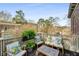 Inviting outdoor patio setting with comfortable seating and natural landscaping at 2260 Peachtree Nw Rd # D6, Atlanta, GA 30309