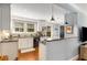 Bright kitchen with white cabinets, granite countertops, and modern appliances at 26 Standish Nw Ave, Atlanta, GA 30309