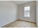 Empty bedroom featuring bright light from a single window at 612 Marimba Pike, Mcdonough, GA 30253