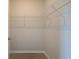 Walk-in closet with wire shelving to organize clothing at 612 Marimba Pike, Mcdonough, GA 30253