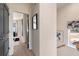Hallway on second level with natural light and hardwood floors to bedrooms at 612 Marimba Pike, Mcdonough, GA 30253