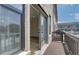 View from the patio of sliding glass doors leading to the home's modern interior at 612 Marimba Pike, Mcdonough, GA 30253