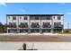 New townhomes with garages and balconies in a well-maintained community at 612 Marimba Pike, Mcdonough, GA 30253
