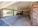 Covered carport with ample space and brick accents, offering convenient parking and protection from the elements at 6348 Garnet Dr, Douglasville, GA 30135