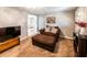 Comfortable living area showcasing modern decor, neutral walls, and bright lighting at 6348 Garnet Dr, Douglasville, GA 30135