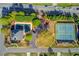Aerial view of community amenities including a swimming pool and tennis courts in a well-maintained area at 5265 Cole Creek Ln, Cumming, GA 30040