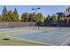 Beautifully maintained tennis courts with scenic surroundings perfect for recreational activities at 5265 Cole Creek Ln, Cumming, GA 30040