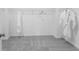 Walk in closet with plush carpeting and white robes at 1395 Windance Lake Dr, Loganville, GA 30052