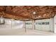 Unfinished basement offers smooth concrete floors, walls with exposed ceiling and potential for garage at 3306 Sleepy Se Ln, Smyrna, GA 30080