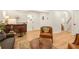 Relaxing living room with mid century bar, a soft couch and stylish decor at 3306 Sleepy Se Ln, Smyrna, GA 30080
