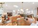 Bright living room featuring hardwood floors with open kitchen and dining area at 3306 Sleepy Se Ln, Smyrna, GA 30080