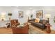 Inviting living room with comfortable seating, hardwood floors, and stylish decor at 3306 Sleepy Se Ln, Smyrna, GA 30080