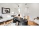 Bright office space featuring hardwood floors, a modern desk, and stylish decor at 3306 Sleepy Se Ln, Smyrna, GA 30080