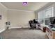 Neutral bedroom with ample natural light, plush carpeting, and plenty of space for relaxation or study at 4315 Balsam Bark Dr, Cumming, GA 30028
