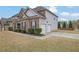 Two-story home featuring brick and siding, attached two-car garage, manicured landscaping, and inviting curb appeal at 4315 Balsam Bark Dr, Cumming, GA 30028