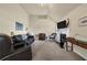 Inviting living room featuring a fireplace, comfortable seating, and ample space for relaxation and entertainment at 4315 Balsam Bark Dr, Cumming, GA 30028