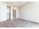 Bedroom featuring neutral carpet and a closet with sliding doors at 1820 Peachtree Nw St # 608, Atlanta, GA 30309
