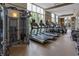 Well-equipped gym with treadmills, elliptical machines, and a weight station at 1820 Peachtree Nw St # 608, Atlanta, GA 30309