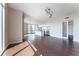 Open living space with hardwood floors, kitchen island, and stainless steel appliances at 1820 Peachtree Nw St # 608, Atlanta, GA 30309
