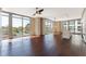 Bright living room with hardwood floors and expansive windows providing beautiful natural light at 1820 Peachtree Nw St # 608, Atlanta, GA 30309
