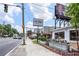 A sunny street view with the Bell Street Burritos sign and outdoor seating, creating a vibrant urban ambiance at 1820 Peachtree Nw St # 608, Atlanta, GA 30309