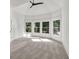 Spacious carpeted bedroom has vaulted ceiling and lots of windows for natural light at 2335 Flat Stone Dr, Cumming, GA 30041