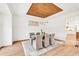 Elegant dining room with stylish lighting, wainscoting, and seating for six at 2335 Flat Stone Dr, Cumming, GA 30041