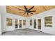 Covered patio featuring a wood ceiling, recessed lights, and multiple glass doors at 2335 Flat Stone Dr, Cumming, GA 30041