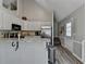 Modern kitchen featuring white cabinets, granite countertops, and a stainless steel refrigerator for convenience at 7040 Shady Oak Ln, Cumming, GA 30040