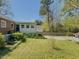 View of a backyard, garage, and additional parking area with a private setting at 1368 Scott Blvd, Decatur, GA 30030